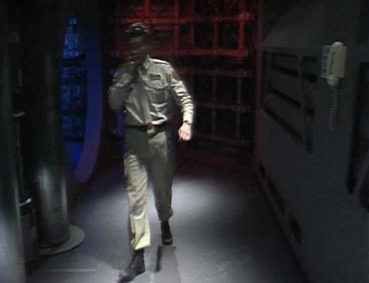 Rimmer walking down a corridor