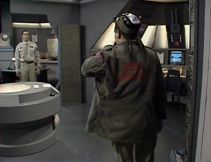 Rimmer walking in from the captain's office