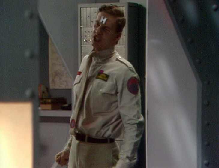 Rimmer with the Captain's Office in the background