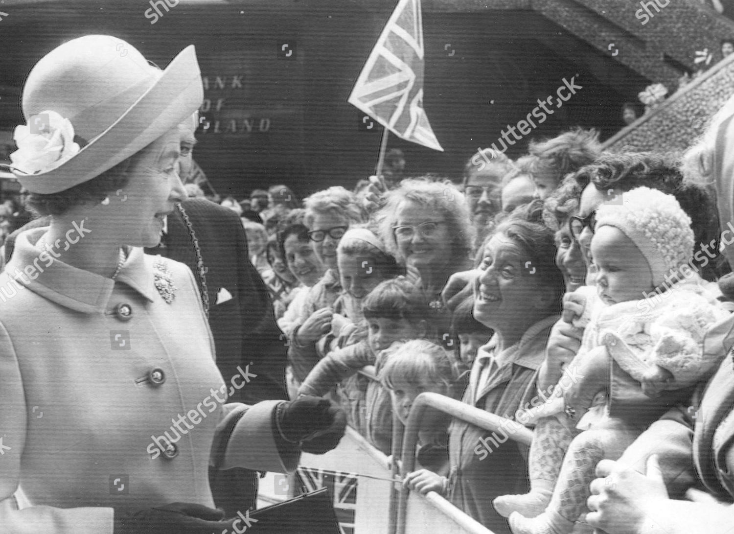 Queen on walkabout - note the barrier