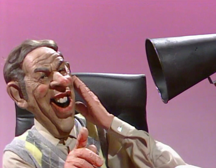 Coleman's Spitting Image puppet, being yelled at through a megaphone