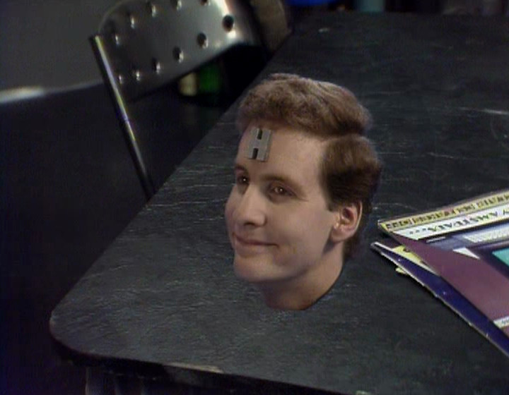Rimmer's head on a table