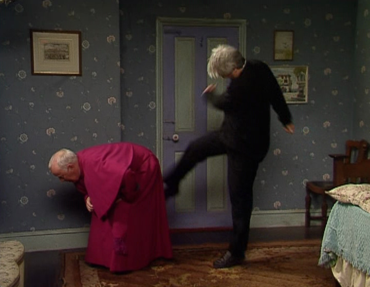 Ted kicking Bishop Brennan up the arse in the studio scene