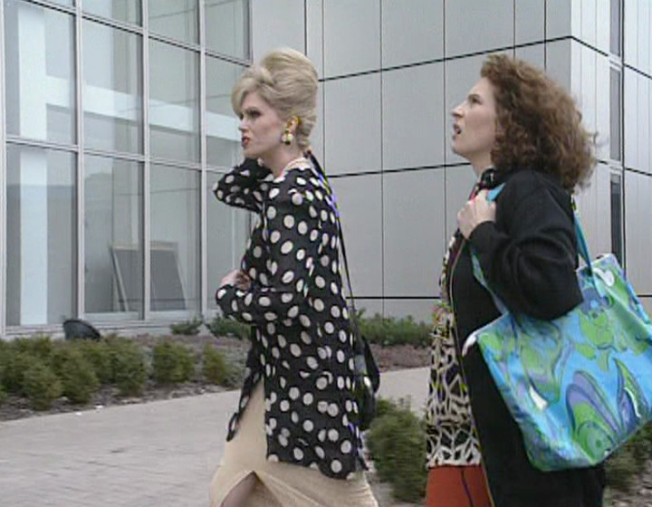 Edina and Patsy outside the office building