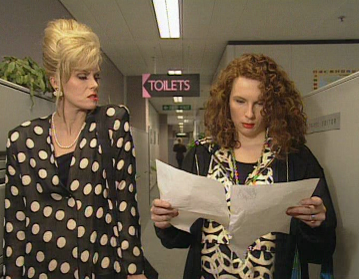 Edina and Patsy, inside the office building, clearly lost