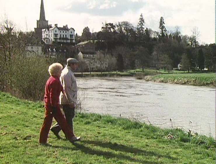 Terry and June walking by the river