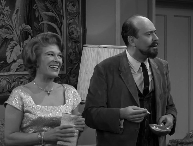 Vonita standing next to Yale, who is holding court