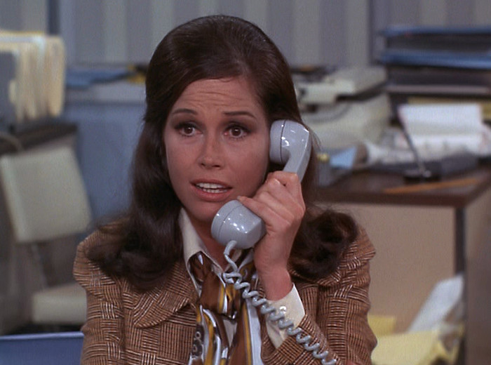 Mary on the phone to Bill