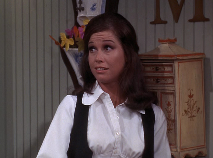 Mary saying goodbye to Bill, looking sad but confident