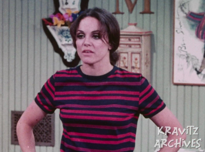 Rhoda with butterflies on the wall